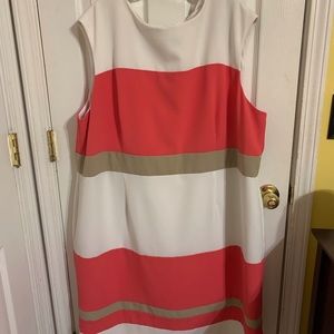 Plus size dress.  95% Polyester.  Machine wash.